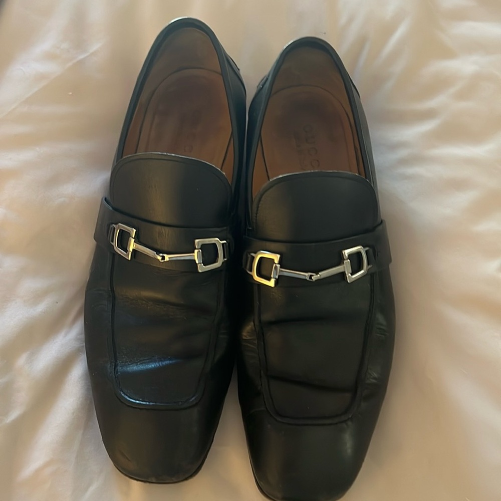 Men’s black Gucci loafers